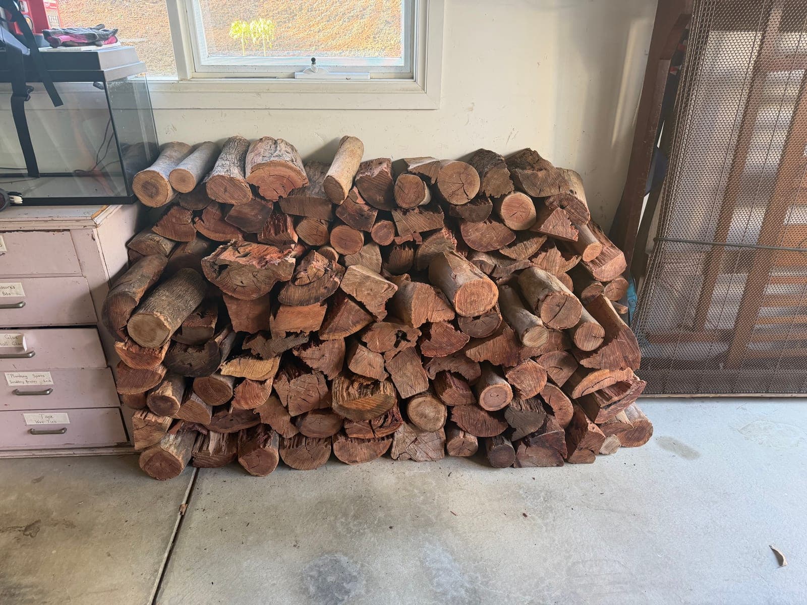 Neatly stacked firewood at customer's home